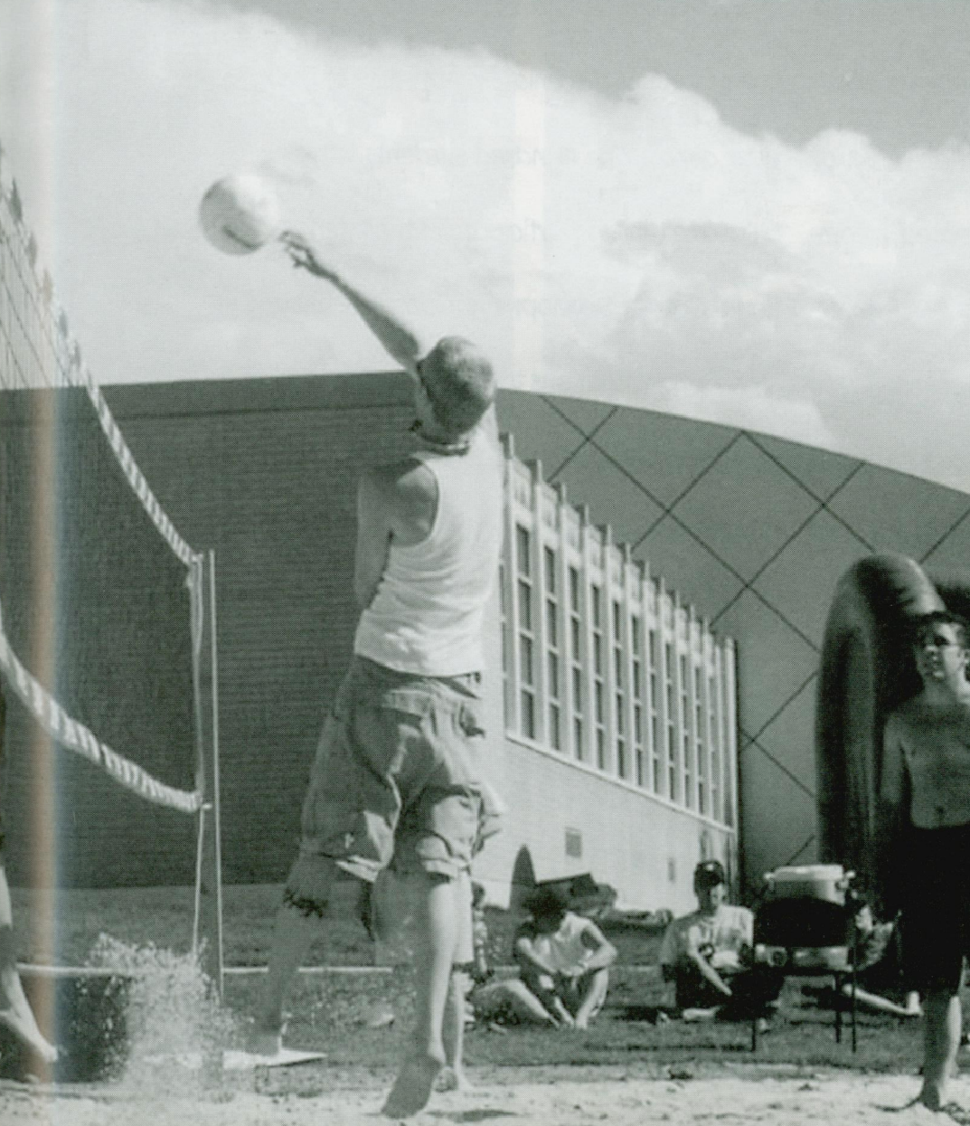 black and white photo, playing volleyball
